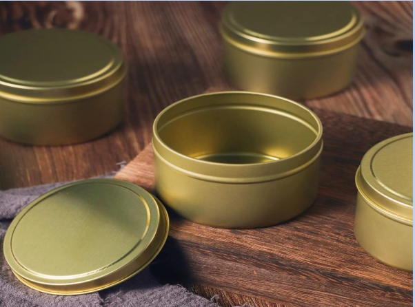 How can I design candle tins to minimize wax shrinkage and sinking? 1 image 23